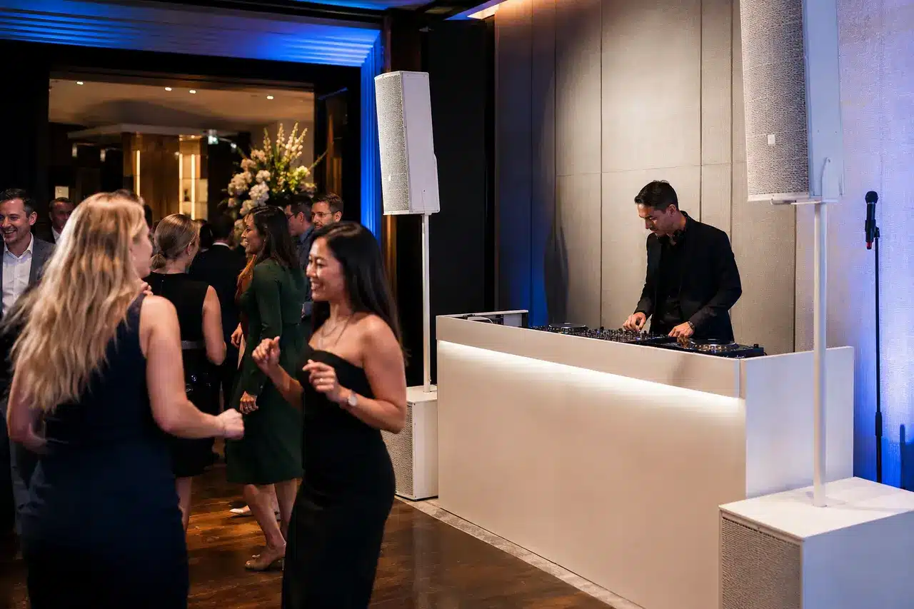 Corporate event DJ with premium white booth, sound and lighting in Melbourne
