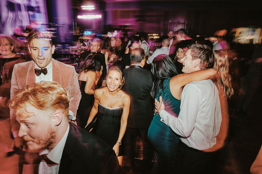 Guests dancing at an end-of-year work party with DJ entertainment in Melbourne